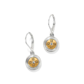 A pair of silver leverback drop earrings with circular gold-toned charms featuring a floral cutout pattern and a small clear central stone, shown on a white background.