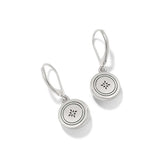 Silver earrings with circular designs on a white background