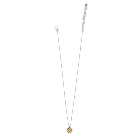Necklace with a yellow pendant on a white background