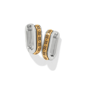 A pair of silver-toned hoop earrings with a central gold-toned band featuring a laser-cut floral pattern, shown on a clean white background.