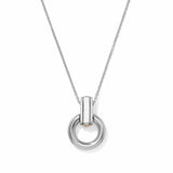 A silver pendant necklace featuring a polished cylindrical bar connected to a thick circular ring, suspended from a delicate silver chain against a white background.