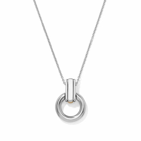 A silver pendant necklace featuring a polished cylindrical bar connected to a thick circular ring, suspended from a delicate silver chain against a white background.