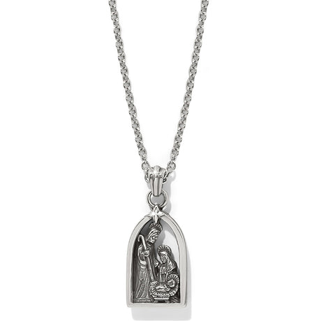 Silver pendant necklace with religious design on a white background