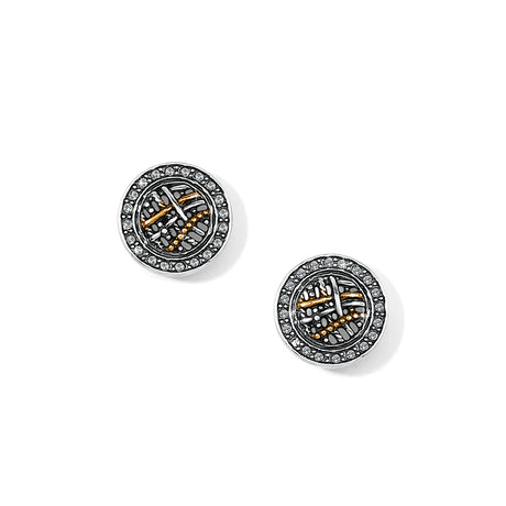 Pair of round earrings with intricate designs on a white background