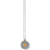 Necklace with a round pendant featuring a gold center on a white background
