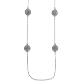 Silver necklace with circular pendant on a white background