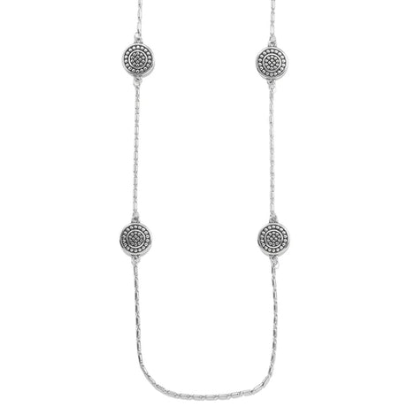 Silver necklace with circular pendant on a white background