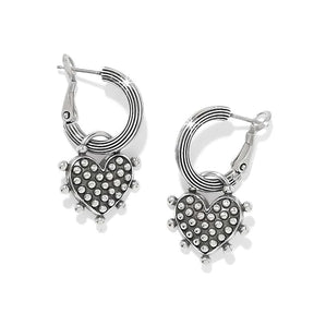 A pair of silver hoop earrings with textured heart-shaped charms covered in small clear rhinestones, shown on a clean white background.