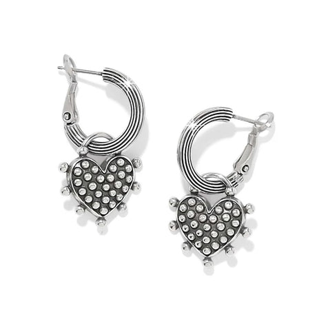 A pair of silver hoop earrings with textured heart-shaped charms covered in small clear rhinestones, shown on a clean white background.