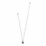 Silver necklace with a heart-shaped pendant on a white background