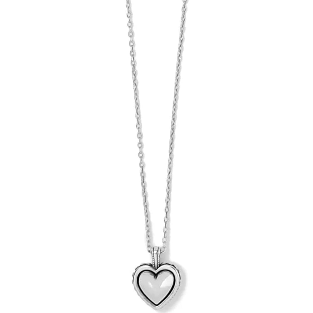 Heart-shaped pendant on a chain against a white background