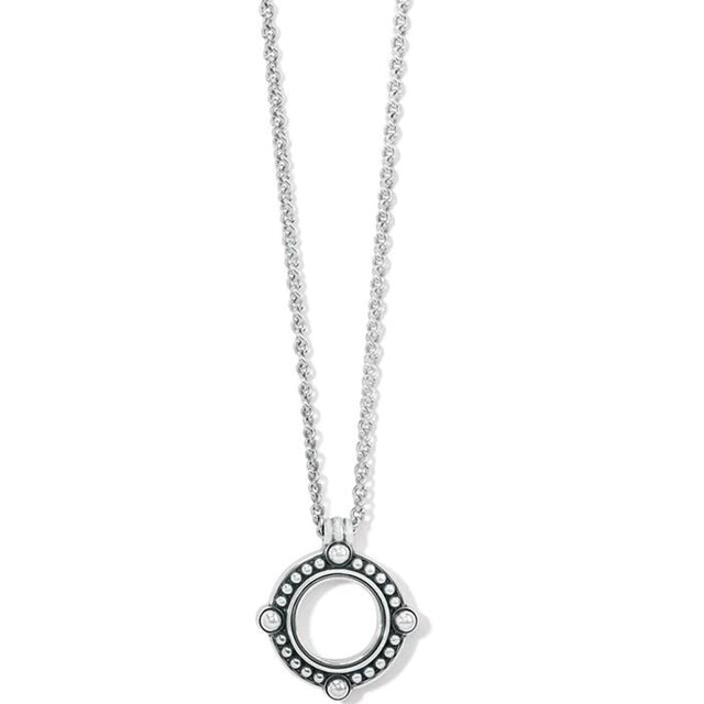 Silver necklace with a round pendant on a white background