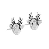 Silver deer head earrings on a white background