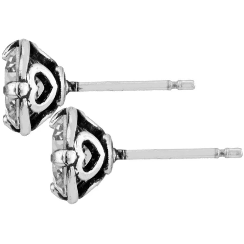 Pair of silver heart-shaped earrings on a white background