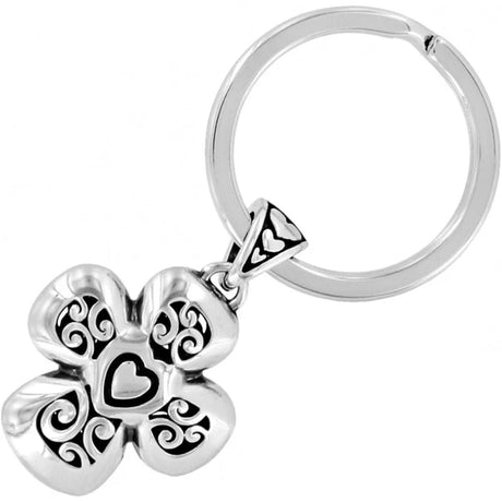 Silver keychain with a clover-shaped pendant on a white background