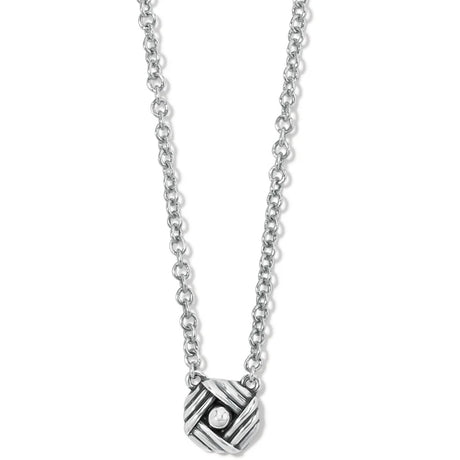 Silver necklace with a geometric pendant on a white background