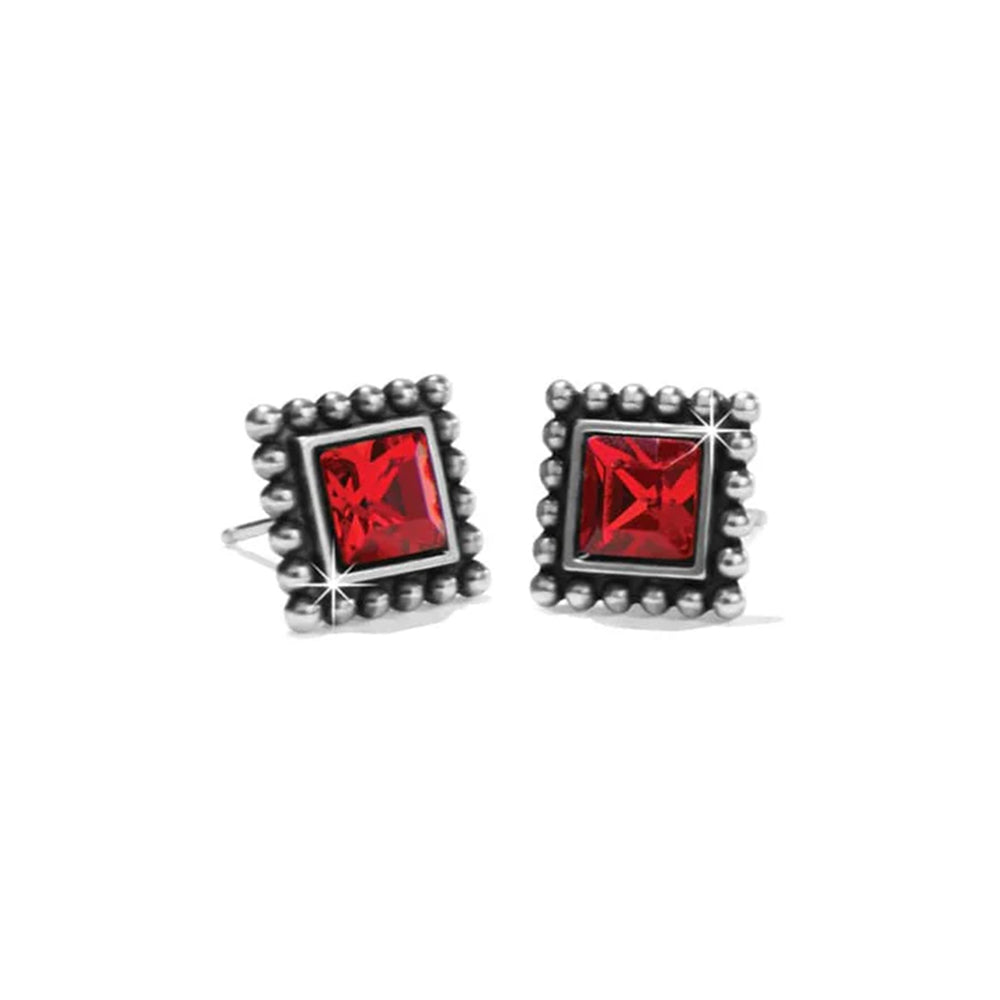 Pair of square stud earrings with red gemstones on a white background