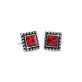 Pair of square stud earrings with red gemstones on a white background