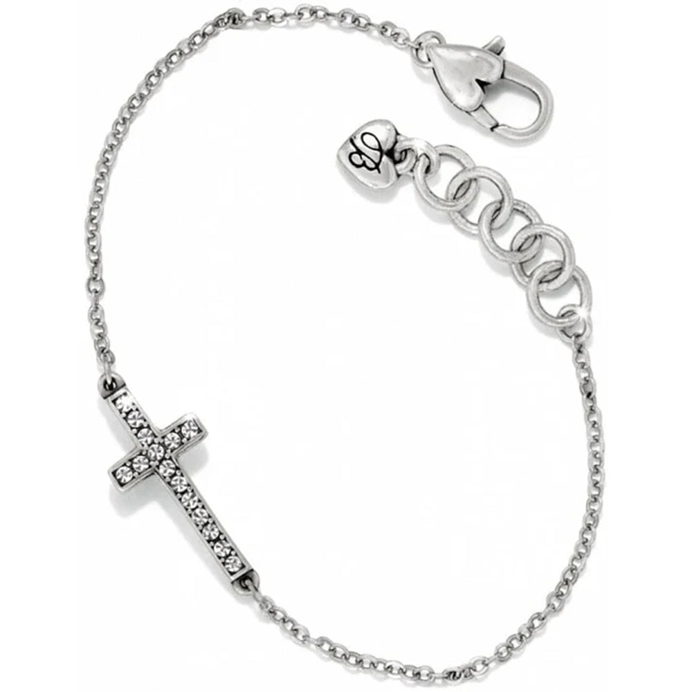 Silver bracelet with a cross charm on a white background