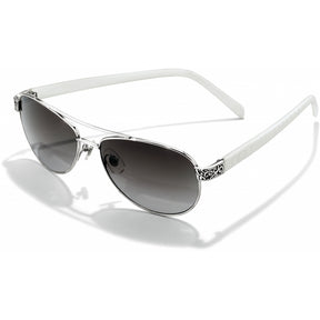 A pair of Brighton Sugar Shack sunglasses with white frames and metal accents, offering 100% UV protection.