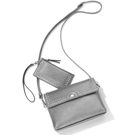 Silver handbag with a matching wallet on a white background