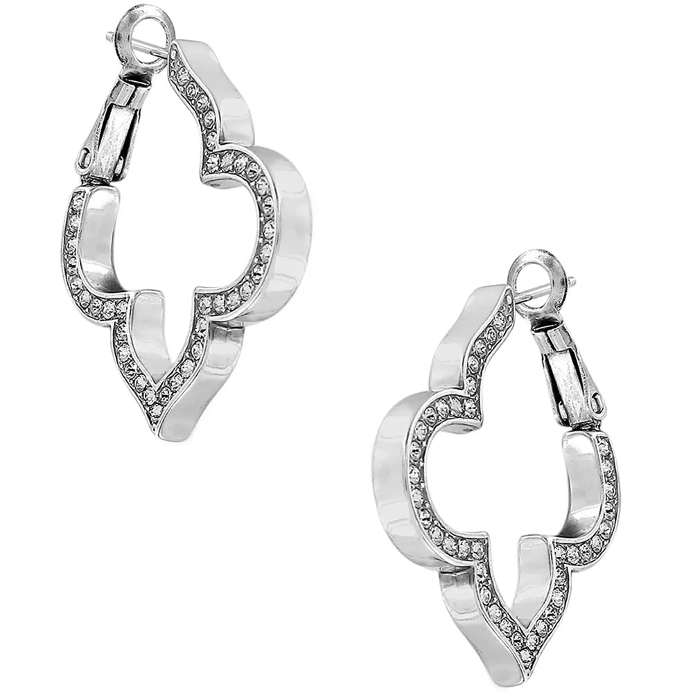 Pair of silver hoop earrings with small stones on a white background