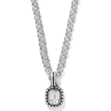 Silver chain necklace with a pendant on a white background