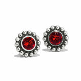 Silver earrings with red gemstones on a white background