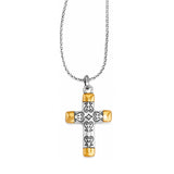 Cross-shaped pendant with gold accents on a white background