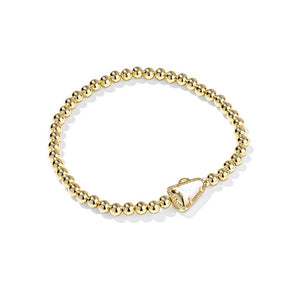 Gold bracelet on a white background