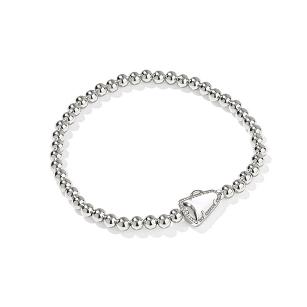 Stretchy silver beaded bracelet on a white background