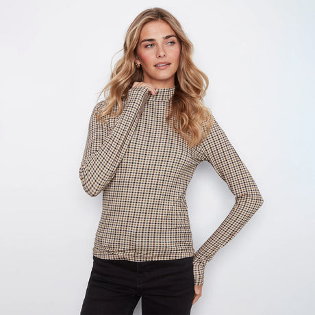 A woman modeling a beige and brown checkered mock neck long-sleeve top against a plain white background.