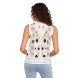 Woman wearing a sleeveless crochet top with geometric pattern on a white background