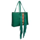 Green handbag with a colorful strap and fringes on a white background