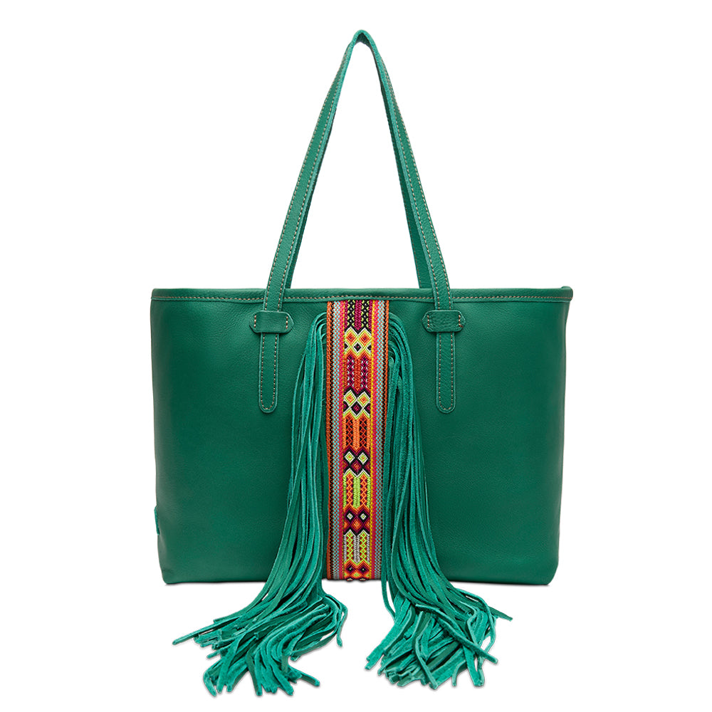 Green handbag with colorful strap and fringes on a white background