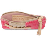 A pink textured zippered pouch with beige leather trim and a pull tab, shown open on a white background. The interior label reads 'CONSUELA'.