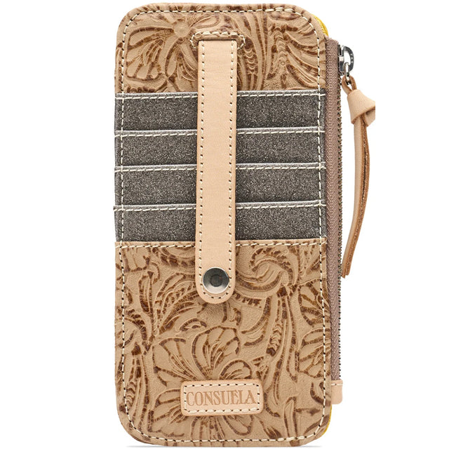 A Consuela zip-around wallet in tan tooled leather with a vertical beige strap, dark gray striped card slots, and a wristlet loop, shown on a white background.