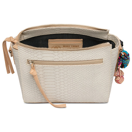 Beige handbag with a strap and decorative elements on a white background