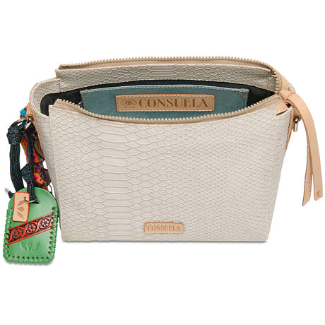 Beige handbag with 'Consuela' branding on a white background