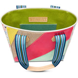 Colorful fabric basket with geometric pattern and visible brand label on a white background