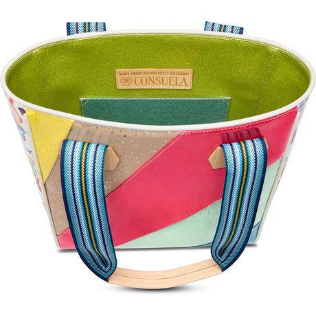 Colorful fabric basket with geometric pattern and visible brand label on a white background