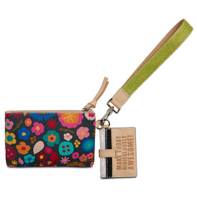 Colorful floral wallet with a keychain and strap on a white background
