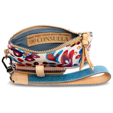 Colorful handbag with floral pattern and blue glitter strap, featuring Consuela brand.