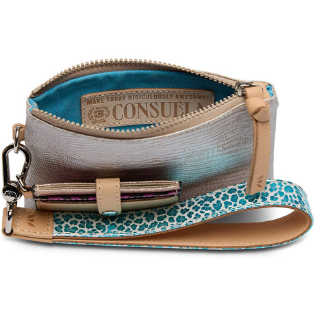 Open handbag with blue interior and leopard print strap on a white background