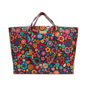 Colorful floral-patterned bag with handles on a white background