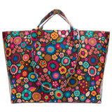 Colorful floral-patterned tote bag on a white background