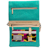 A turquoise glittery fabric organizer pouch with beige trim and multiple zippered compartments, including a colorful patterned card holder pocket on the front. The interior text reads 'MAKE TODAY RIDICULOUSLY AWESOME!' and a small logo patch says 'LOUNGE'.