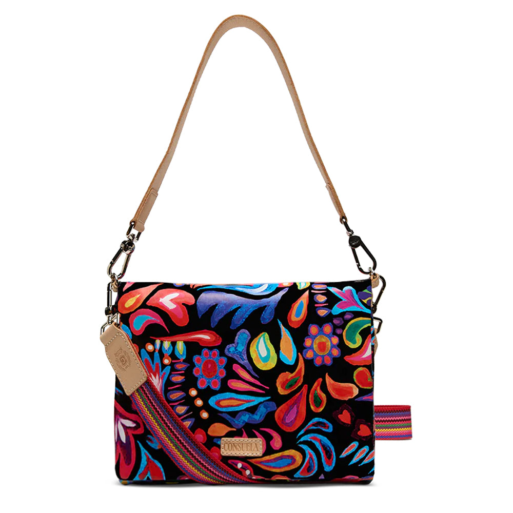 a colorful handbag with floral decorations, with a white background