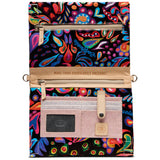 a colorful handbag with floral decorations, with a white background