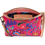Colorful handbag with floral pattern and 'Consuela' branding on a white background